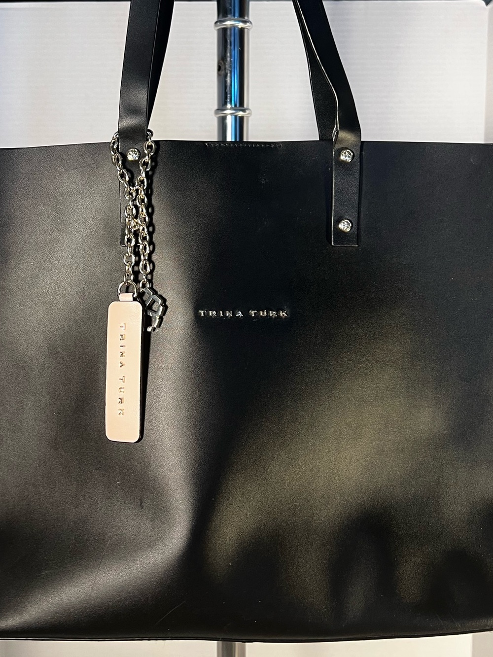 Trina Turk Black Smooth Leather-Style Tote with Chain Tag